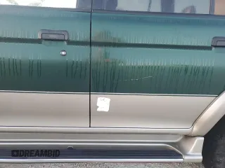 1999 Mitsubishi Montero Limited z VIN JA4LS41RXXP010154, wystawiony jako Copart lot #77666734 z przebiegiem Nie podano mil oraz Szkoda całkowita • Salvage title. Historia ofert i sprzedaży dostępna na DreamBid. Obrazek 13.