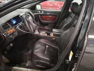 2014 Lincoln MKS with VIN 1LNHL9DK3EG611354, listed as a Copart auction lot 49008525 with 114,232 mi miles and Salvage Title. Bid and sale history available at carsss.com. Image 7.