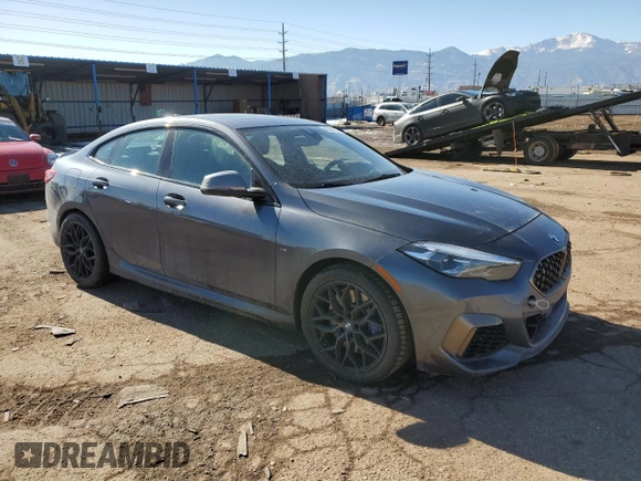 2020 BMW 2 Series M235i xDrive with VIN WBA13AL08L7F58414, listed as a Copart auction lot 42387115 with 60,835 mi miles and Salvage Title. Bid and sale history available at carsss.com. Image 4.