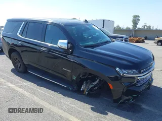 2021 Chevrolet Tahoe Premier z VIN 1GNSCSKD5MR112698, wystawiony jako IAAI lot #42277852 z przebiegiem 49 861 mil mil oraz . Historia ofert i sprzedaży dostępna na DreamBid. Obrazek 1.