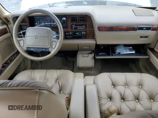 1992 Chrysler New Yorker z VIN 1C3XV66R9ND794543, wystawiony jako Copart lot #45347925 z przebiegiem 46 550 mil mil oraz Tytuł czysty. Historia ofert i sprzedaży dostępna na DreamBid. Obrazek 8.