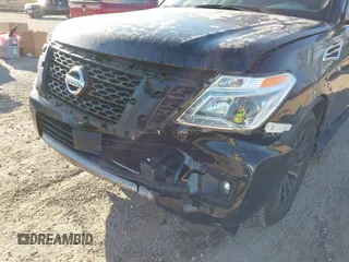 2019 Nissan Armada Platinum with VIN JN8AY2NE7K9758062, listed as a IAAI auction lot 41752480 with 122,252 mi miles. Bid and sale history available at carsss.com. Image 6.