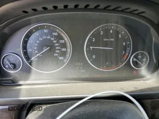 2013 BMW 5 Series 535i with VIN WBAFR7C56DC827227, listed as a Copart auction lot 50571785 with 104,128 mi miles and Clean Title. Bid and sale history available at DreamBid. Image 9.