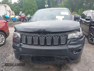 2018 Jeep Grand Cherokee Upland with VIN 1C4RJFAG4JC249243, listed as a IAAI auction lot 42291794 with 194,501 mi miles and . Bid and sale history available at DreamBid. Image 12.