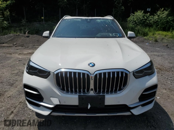2023 BMW X5 xDrive40i with VIN 5UXCR6C03P9P75351, listed as a Copart auction lot 61465655 with 24,883 mi miles and Salvage title. Bid and sale history available at DreamBid. Image 5.