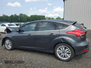 2018 Ford Focus Titanium z VIN 1FADP3N20JL271719, wystawiony jako Copart lot #60784755 z przebiegiem 116 118 mil mil oraz Szkoda całkowita • Salvage title. Historia ofert i sprzedaży dostępna na DreamBid. Obrazek 2.