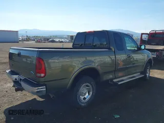 2002 Ford F-150 XL with VIN 2FTRX18W42CA61719, listed as a IAAI auction lot 42146516 with 99,774 mi miles and . Bid and sale history available at DreamBid. Image 4.