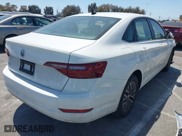 2021 Volkswagen Jetta S z VIN 3VWC57BU4MM037088, wystawiony jako IAAI lot #42087111 z przebiegiem 82 728 mil mil oraz . Historia ofert i sprzedaży dostępna na DreamBid. Obrazek 4.