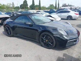 2020 Porsche 911 Carrera z VIN WP0CA2A90LS251855, wystawiony jako IAAI lot #42226707 z przebiegiem 37 163 mil mil oraz . Historia ofert i sprzedaży dostępna na DreamBid. Obrazek 1.