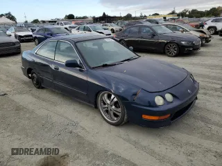 1998 Acura Integra LS with VIN JH4DB7653WS002571, listed as a Copart auction lot 73806394 with 258,143 mi miles and Salvage title. Bid and sale history available at DreamBid. Image 4.