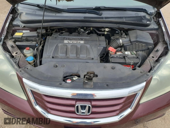 2008 Honda Odyssey EX-L z VIN 5FNRL38758B065246, wystawiony jako Copart lot #52621875 z przebiegiem 204 474 mil mil oraz Szkoda całkowita • Salvage title. Historia ofert i sprzedaży dostępna na DreamBid. Obrazek 12.