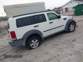 2007 Dodge Nitro SXT with VIN 1D8GT28K27W551689, listed as a IAAI auction lot 41914488 with 194,443 mi miles. Bid and sale history available at carsss.com. Image 4.