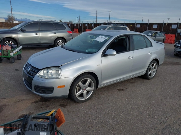 2010 Volkswagen Jetta Wolfsburg Edition with VIN 3VWRJ7AJ5AM049081, listed as a IAAI auction lot 41765760 with 123,621 mi miles and . Bid and sale history available at DreamBid. Image 2.