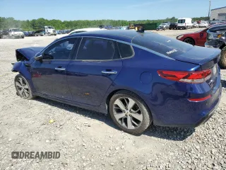 2019 Kia Optima LX z VIN 5XXGT4L31KG289703, wystawiony jako Copart lot #57663005 z przebiegiem 126 689 mil mil oraz Szkoda całkowita • Salvage title. Historia ofert i sprzedaży dostępna na DreamBid. Obrazek 2.