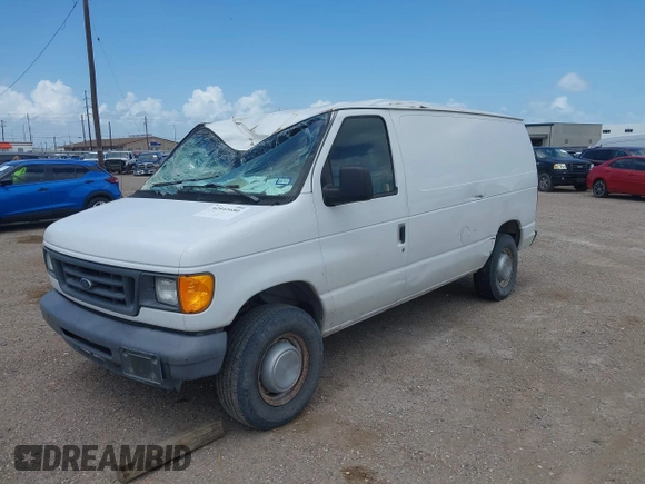 2005 Ford Econoline Cargo with VIN 1FTNE24L65HB17842, listed as a IAAI auction lot 42441680 with 216,578 mi miles and . Bid and sale history available at DreamBid. Image 2.