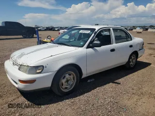1996 Toyota Corolla with VIN 1NXBA02E7TZ499077, listed as a Copart auction lot 64685305 with 146,694 mi miles and Salvage title. Bid and sale history available at DreamBid. Image 1.
