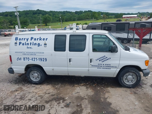 2006 Ford Econoline Cargo with VIN 1FTRE14W56HA74697, listed as a IAAI auction lot 42341374 with 153,519 mi miles and . Bid and sale history available at DreamBid. Image 12.