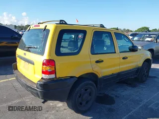 2002 Ford Escape XLS Choice with VIN 1FMYU01132KD56671, listed as a IAAI auction lot 41552541 with 245,923 mi miles and . Bid and sale history available at DreamBid. Image 6.