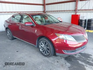 2014 Lincoln MKS z VIN 1LNHL9DK0EG606497, wystawiony jako IAAI lot #42279603 z przebiegiem 129 972 mil mil oraz . Historia ofert i sprzedaży dostępna na DreamBid. Obrazek 1.