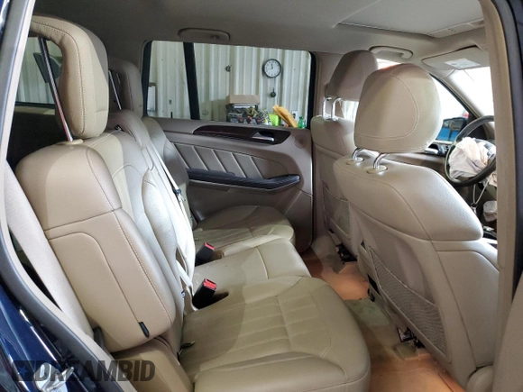 2013 Mercedes-Benz GL 450 z VIN 4JGDF7CE3DA147859, wystawiony jako Copart lot #53194885 z przebiegiem 234 182 mil mil oraz Szkody całkowita. Historia ofert i sprzedaży dostępna na DreamBid. Obrazek 11.