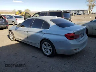 2016 BMW 3 Series with VIN WBA8F1C57GK438945, listed as a Copart auction lot 49090955 with 176,869 mi miles and Salvage title. Bid and sale history available at DreamBid. Image 2.