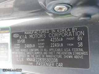 2009 Kia Optima LX with VIN KNAGE228195301338, listed as a IAAI auction lot 41904987 with 153,197 mi miles. Bid and sale history available at carsss.com. Image 9.