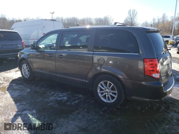 2018 Dodge Grand Caravan SXT with VIN 2C4RDGCGXJR325632, listed as a Copart auction lot 46326655 with 128,692 mi miles and Clean Title. Bid and sale history available at DreamBid. Image 2.