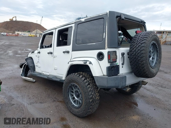 2015 Jeep Wrangler Unlimited Sahara with VIN 1C4BJWEG5FL518191, listed as a IAAI auction lot 41914581 with 107,433 mi miles. Bid and sale history available at carsss.com. Image 3.