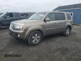 2011 Honda Pilot EX-L with VIN 5FNYF4H64BB022010, listed as a Copart auction lot 52857855 with 169,619 mi miles and Clean Title. Bid and sale history available at carsss.com. Image 1.