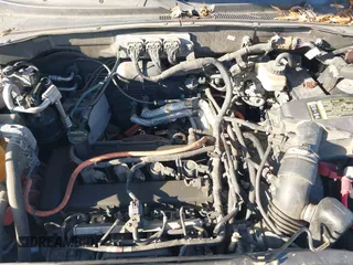 2006 Ford Escape Hybrid with VIN 1FMYU96H56KB49358, listed as a IAAI auction lot 41600419 with 161,661 mi miles and . Bid and sale history available at DreamBid. Image 10.