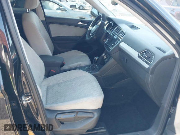 2021 Volkswagen Tiguan S with VIN 3VV1B7AX2MM142289, listed as a IAAI auction lot 42403346 with 71,182 mi miles and . Bid and sale history available at DreamBid. Image 5.