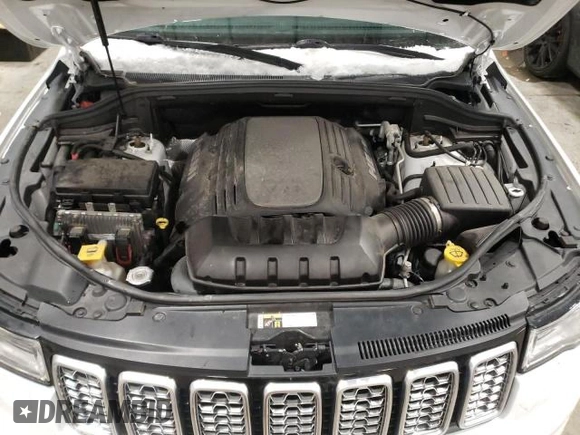 2019 Jeep Grand Cherokee Summit with VIN 1C4RJFJT2KC541777, listed as a Copart auction lot 37762784 with 99,248 mi miles and Salvage Title. Bid and sale history available at carsss.com. Image 12.