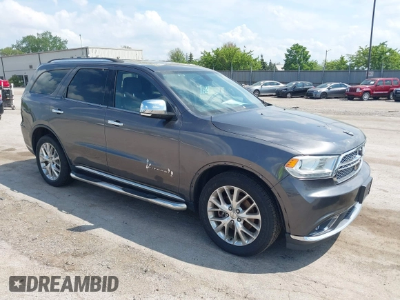 2014 Dodge Durango Citadel with VIN 1C4RDJEG0EC978611, listed as a IAAI auction lot 42250344 with 200,412 mi miles and . Bid and sale history available at DreamBid. Image 1.