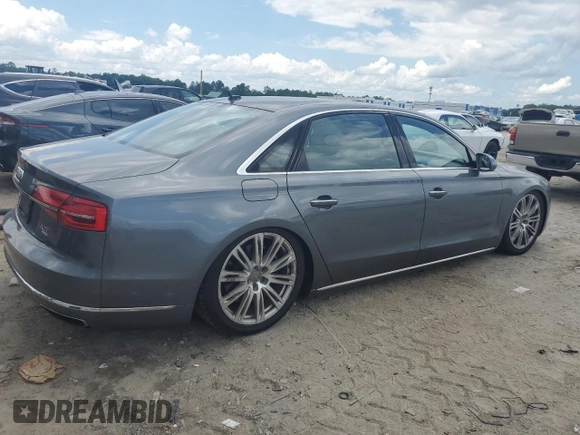 2015 Audi A8 4.0T with VIN WAU32AFD5FN040395, listed as a Copart auction lot 60909515 with 79,379 mi miles and Salvage title. Bid and sale history available at DreamBid. Image 3.