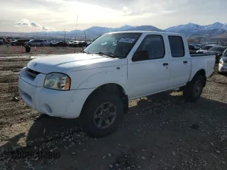 2004 Nissan Frontier XE z VIN 1N6ED27T24C429793, wystawiony jako Copart lot #87256024 z przebiegiem 219 611 mil mil oraz Czysty tytuł • Clean title. Historia ofert i sprzedaży dostępna na DreamBid. Obrazek 1.