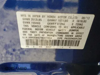 2013 Honda Fit Sport with VIN JHMGE8H57DC072654, listed as a Copart auction lot 48356135 with 82,557 mi miles and Salvage Title. Bid and sale history available at carsss.com. Image 12.