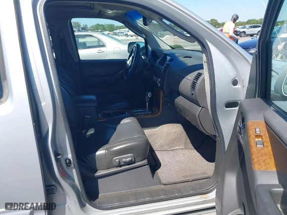 2006 Nissan Pathfinder SE with VIN 5N1AR18W96C655348, listed as a IAAI auction lot 41789686 with 213,238 mi miles. Bid and sale history available at carsss.com. Image 5.