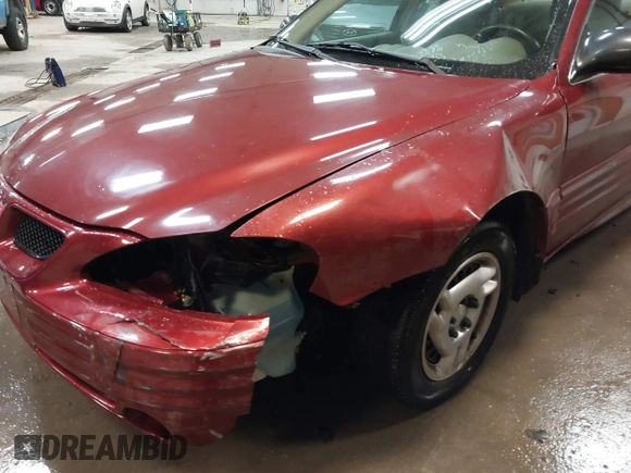 2002 Pontiac Grand Am SE z VIN 1G2NE52F92C291335, wystawiony jako IAAI lot #41665150 z przebiegiem 75 552 mil mil oraz . Historia ofert i sprzedaży dostępna na DreamBid. Obrazek 18.