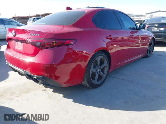 2018 Alfa Romeo Giulia with VIN ZARFAEBN8J7567620, listed as a IAAI auction lot 41738301 with 80,194 mi miles. Bid and sale history available at carsss.com. Image 4.