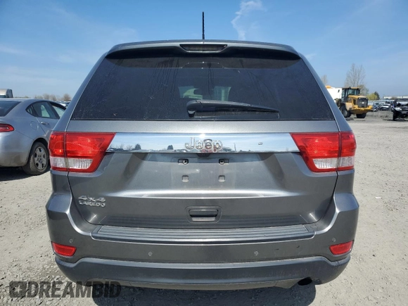 2011 Jeep Grand Cherokee Laredo with VIN 1J4RR4GGXBC702300, listed as a Copart auction lot 49736255 with 163,684 mi miles and Salvage Title. Bid and sale history available at carsss.com. Image 6.