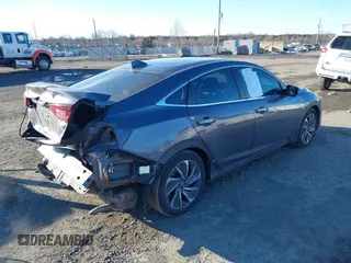 2022 Honda Insight Touring with VIN 19XZE4F99NE008697, listed as a IAAI auction lot 41381095 with 59,310 mi miles and . Bid and sale history available at DreamBid. Image 4.