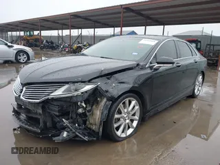 2015 Lincoln MKZ z VIN 3LN6L2G90FR621891, wystawiony jako IAAI lot #41968088 z przebiegiem 128 988 mil mil oraz . Historia ofert i sprzedaży dostępna na DreamBid. Obrazek 19.