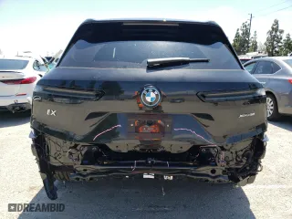 2024 BMW iX xDrive50 with VIN WB523CF05RCN96948, listed as a Copart auction lot 50858304 with 8,923 mi miles and Salvage Title. Bid and sale history available at carsss.com. Image 6.