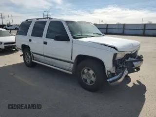 1999 GMC Yukon with VIN 1GKEK13R4XJ751482, listed as a Copart auction lot 48035075 with 154,800 mi miles and Salvage Title. Bid and sale history available at carsss.com. Image 4.