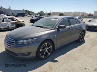 2015 Ford Taurus SEL with VIN 1FAHP2E8XFG209390, listed as a Copart auction lot 58992305 with 99,498 mi miles and Salvage title. Bid and sale history available at DreamBid. Image 1.