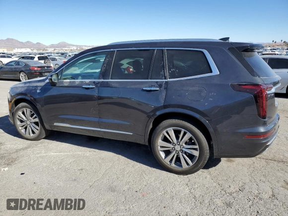 2022 Cadillac XT6 Premium Luxury with VIN 1GYKPCRS9NZ125022, listed as a Copart auction lot 42392485 with 34,703 mi miles and Salvage Title. Bid and sale history available at carsss.com. Image 2.