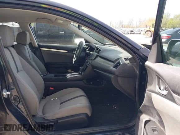 2021 Honda Civic LX z VIN 19XFC2F65ME000324, wystawiony jako IAAI lot #42137375 z przebiegiem 78 473 mil mil oraz . Historia ofert i sprzedaży dostępna na DreamBid. Obrazek 5.