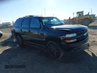 2001 Chevrolet Tahoe LS z VIN 1GNEC13T81R141783, wystawiony jako IAAI lot #41436093 z przebiegiem 266 326 mil mil oraz . Historia ofert i sprzedaży dostępna na DreamBid. Obrazek 1.