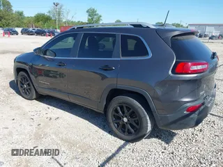 2016 Jeep Cherokee Latitude z VIN 1C4PJLCB5GW264607, wystawiony jako IAAI lot #42275637 z przebiegiem 64 264 mil mil oraz . Historia ofert i sprzedaży dostępna na DreamBid. Obrazek 3.