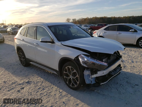 2020 BMW X1 xDrive28i with VIN WBXJG9C02L3L57542, listed as a Copart auction lot 67003112 with 18,619 mi miles. Bid and sale history available at carsss.com. Image 1.